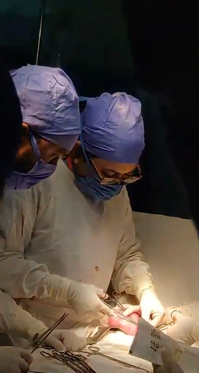 Dr. Sadre Alam Ansari with patient